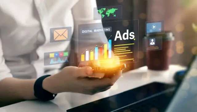 Porównanie Google Ads i Facebook Ads na tle wykresów i ikon symbolizujących reklamy online